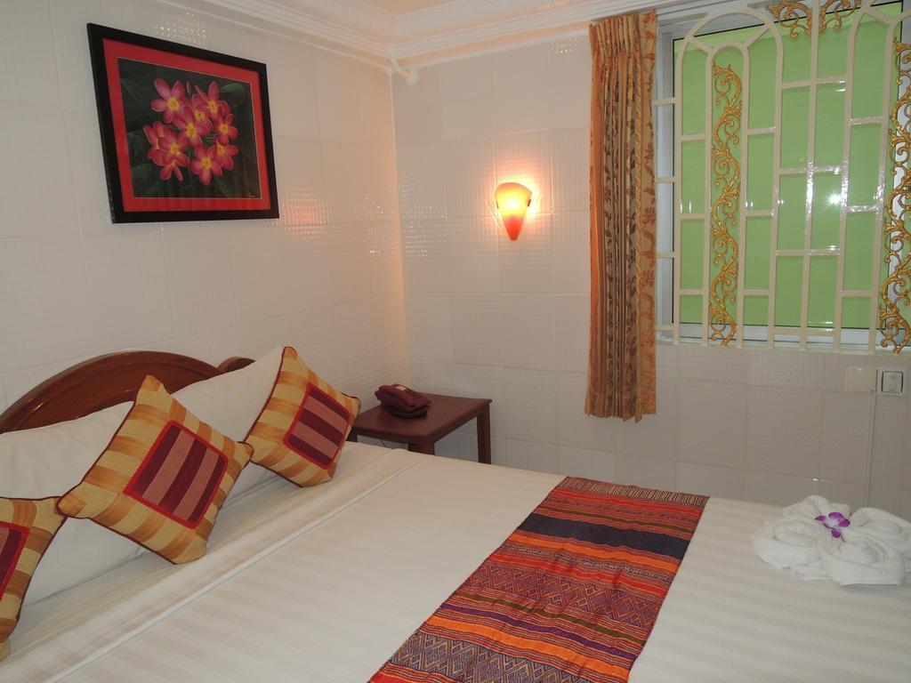 Fancy Guesthouse Phnom Penh Habitación foto